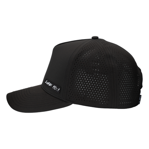 Side view of black cap with white "LUKE 18:1" logo