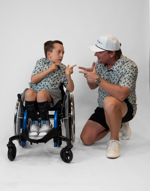 two people both wearing performance golf polos