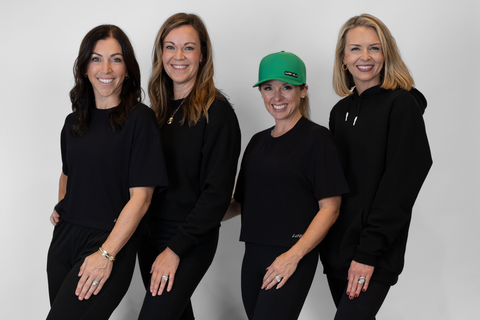 group of women one wearing Men's Black Fleece Hoodie