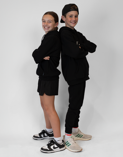boy and girl wearing Youth Black Fleece Hoodie