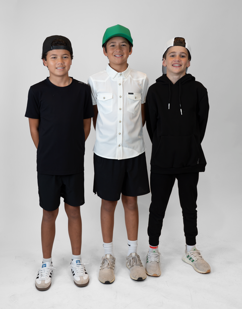 Group of boys with one Boy wearing Youth White S/S Pearl Snap Shirt