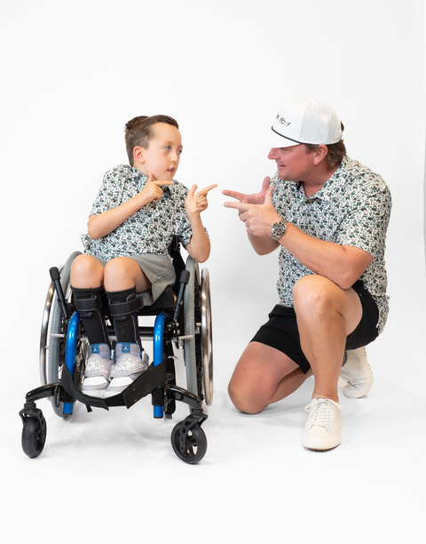 two people both wearing performance golf polos
