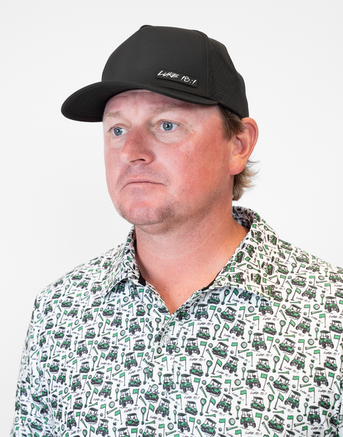 man wearing black hat with "LUKE 18:1" text