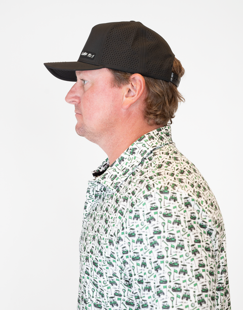 side view of man wearing black hat with "LUKE 18:1" text