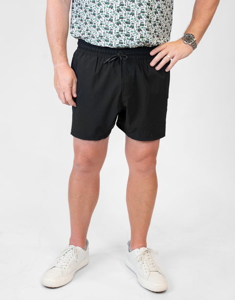 Man wearing Men's Black 6" Airflow Short