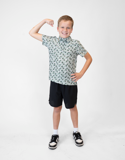 Boy wearing Youth Performance Golf Polo
