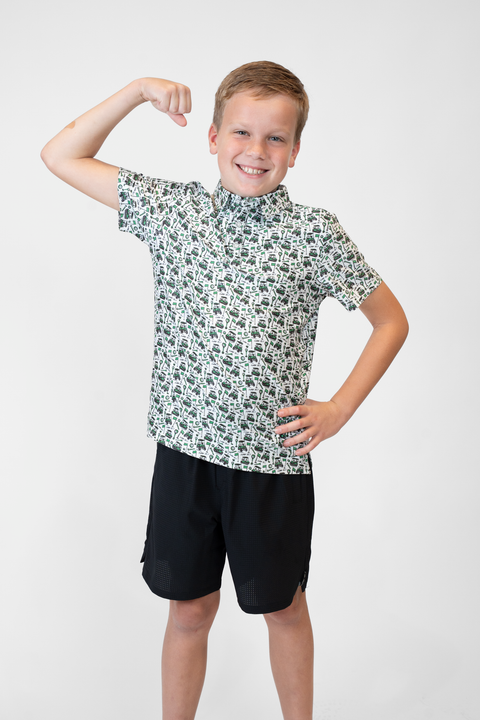 Boy wearing Youth Performance Golf Polo