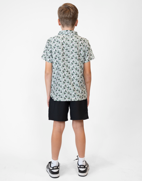 Rear view of boy wearing Youth Performance Golf Polo