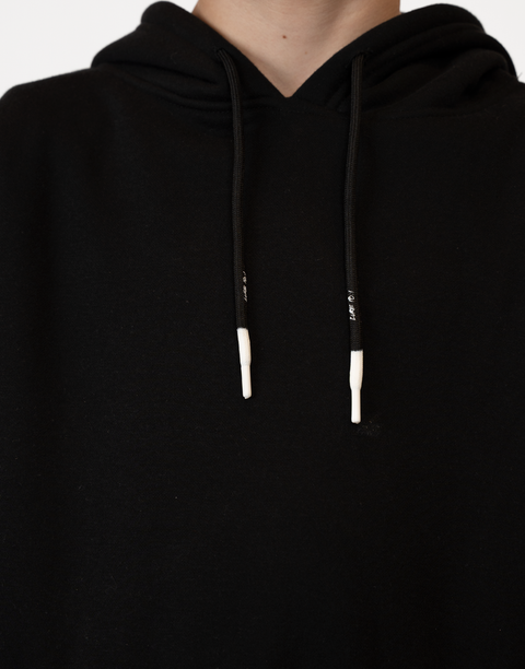 Boy wearing Youth Black Fleece Hoodie showing white tips and "LUKE 18:1" text on drawstring