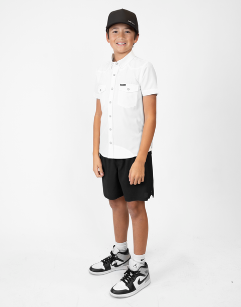 Boy wearing Youth White S/S Pearl Snap Shirt