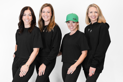 group of women one wearing Men's Black Fleece Hoodie