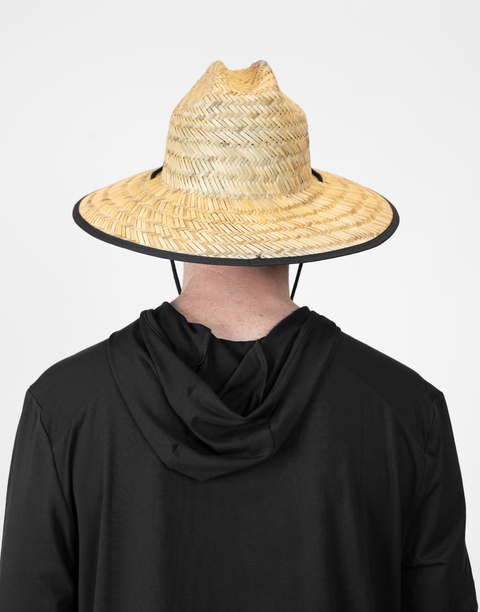 rear view of person wearing straw hat