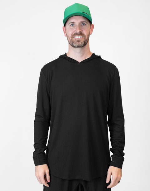 Man wearing Men's Black Bamboo Performance Hoodie
