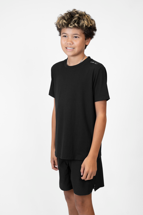 Boy wearing Youth black Bamboo Performance Tee with "LUKE 18:1" text on shoulder