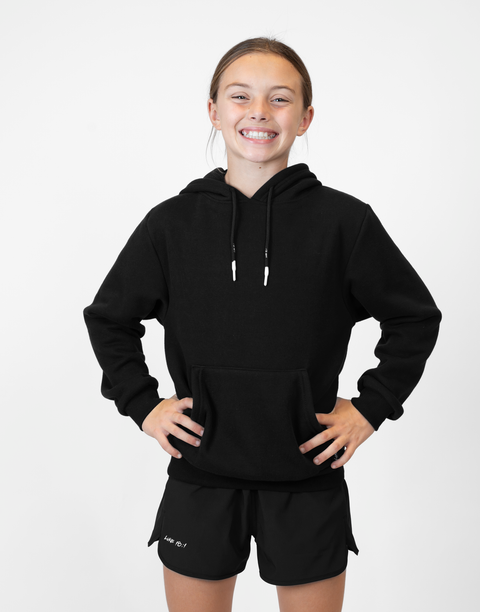 Girl wearing Youth Black Fleece Hoodie