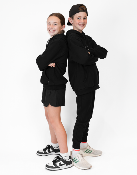 boy and girl wearing Youth Black Fleece Hoodie