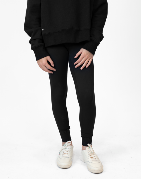 front view of person wearing black Ladies Performance Legging