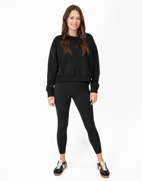 Person wearing black Ladies Performance Legging