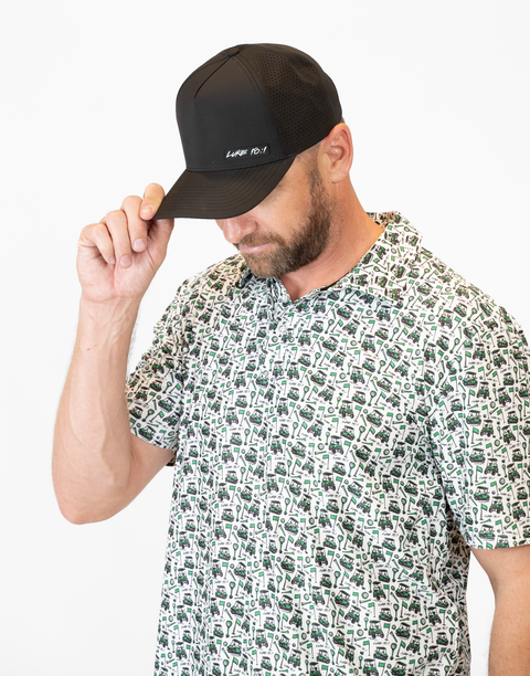 Man wearing black hat with "LUKE 18:1" text