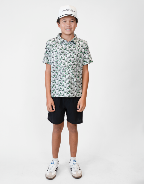 Boy wearing Youth Performance Golf Polo