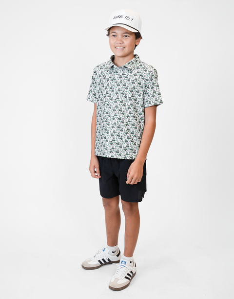 Boy wearing Youth Performance Golf Polo