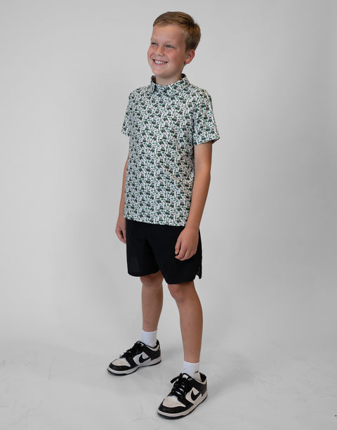 Boy wearing Youth Performance Golf Polo