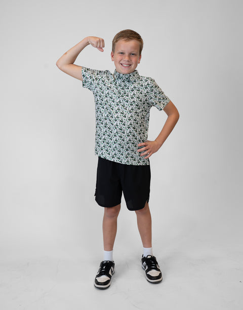 Boy wearing Youth Performance Golf Polo