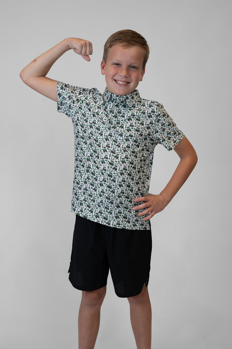 Boy wearing Youth Performance Golf Polo