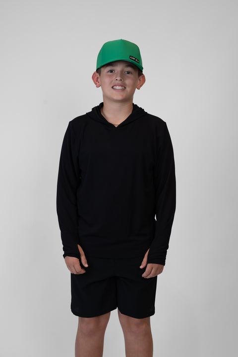Boy wearing Youth Black Bamboo Performance Hoodie
