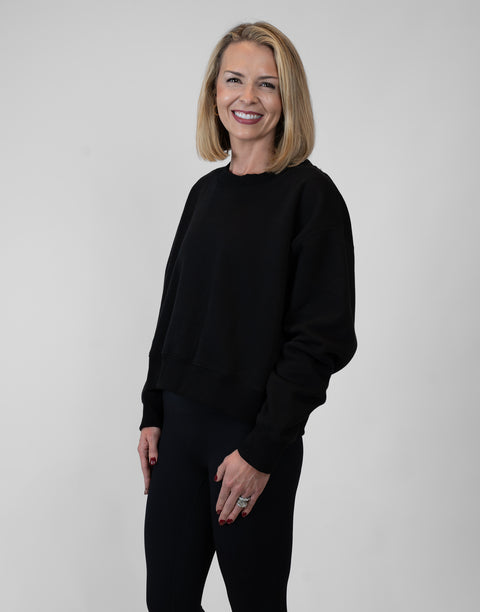 Woman wearing Ladies Black Relaxed Fleece Crew