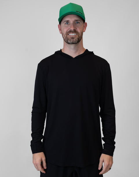 Man wearing Men's Black Bamboo Performance Hoodie