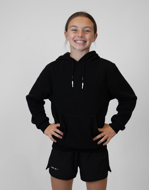 Girl wearing Youth Black Fleece Hoodie