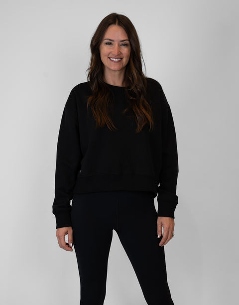Woman wearing Ladies Black Relaxed Fleece Crew