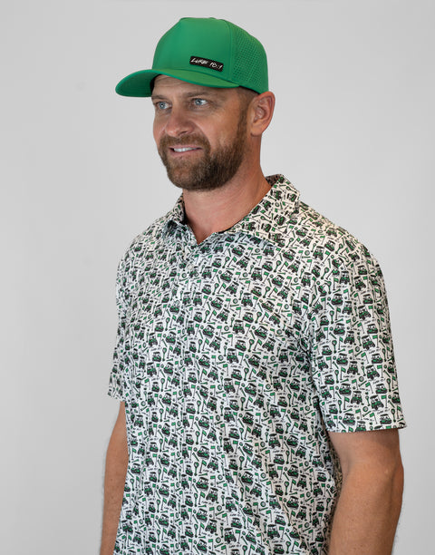 Man wearing kelly green hat with "LUKE 18:1" text