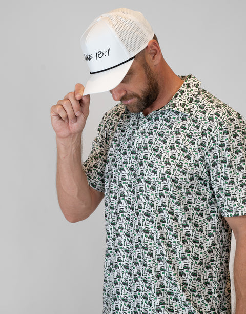 Person wearing white hat with black "LUKE 18:1" text