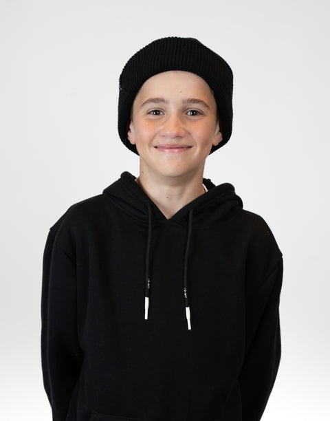 front view of person wearing black beanie