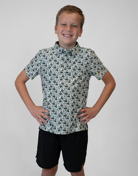 Boy wearing Youth Performance Golf Polo