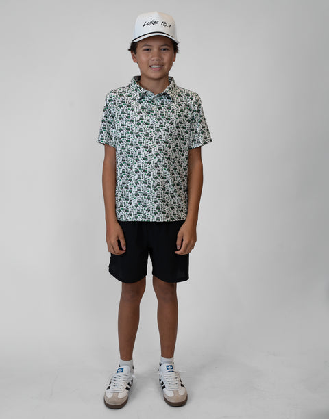Boy wearing Youth Performance Golf Polo