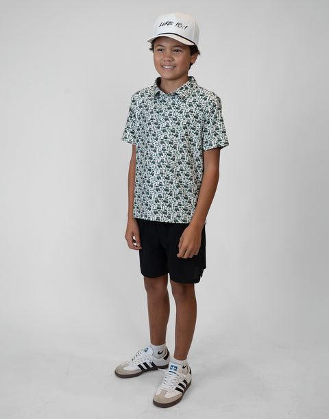 Boy wearing Youth Performance Golf Polo