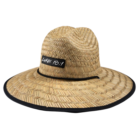 Straw hat with "LUKE 18:1" patch on front