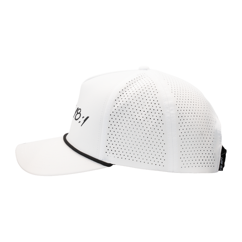 Side view of White hat with black "LUKE 18:1" text on front