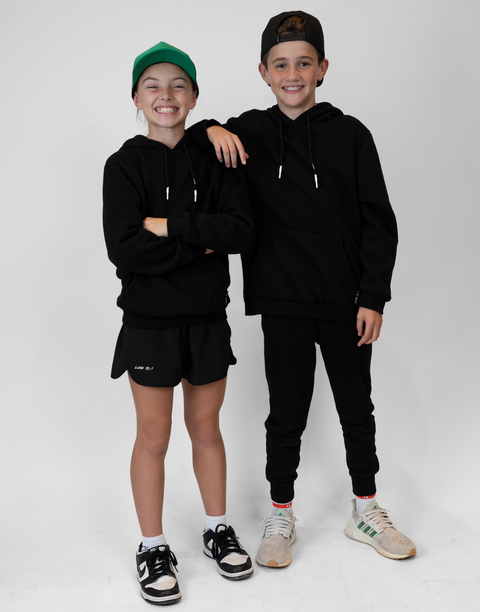 boy and girl wearing Youth Black Fleece Hoodie