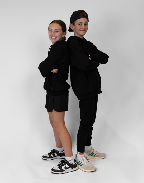 boy and girl wearing Youth Black Fleece Hoodie