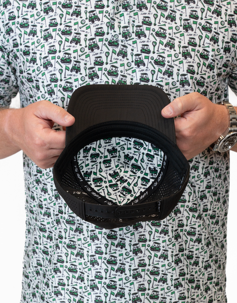 inside view of black hat showing pattern and "LUKE 18:1" text on interior