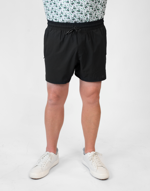 Man wearing Men's Black 6" Airflow Short