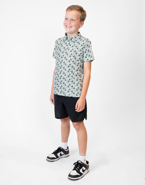 Boy wearing Youth Performance Golf Polo