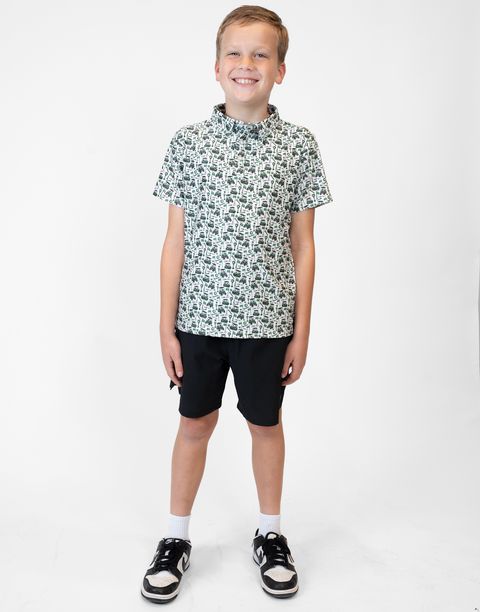 Boy wearing Youth Performance Golf Polo