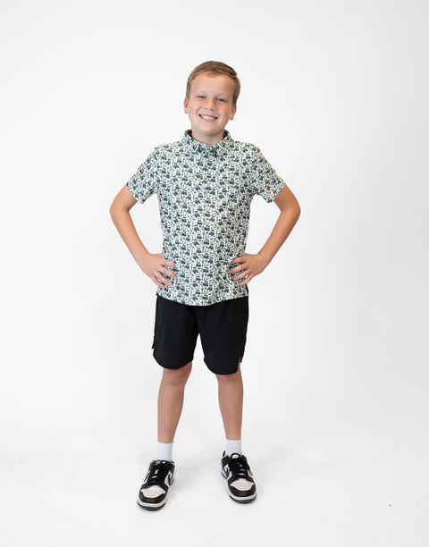 Boy wearing Youth Performance Golf Polo