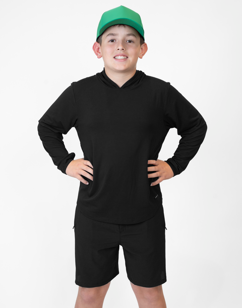 Boy wearing Youth Black Bamboo Performance Hoodie