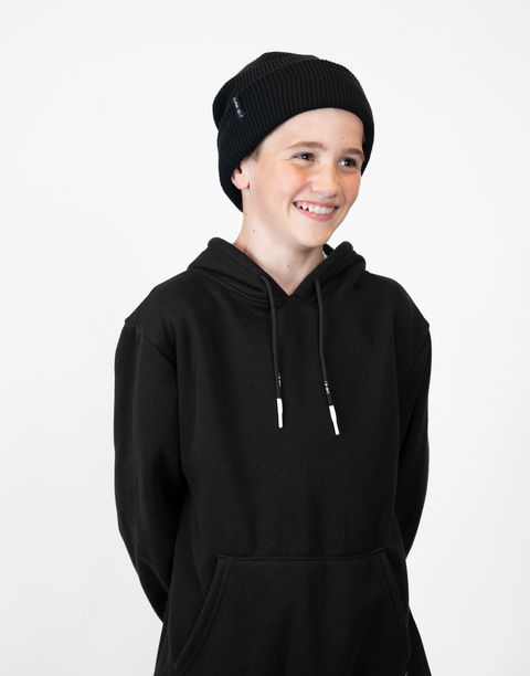 person wearing black beanie with "LUKE 18:1" text